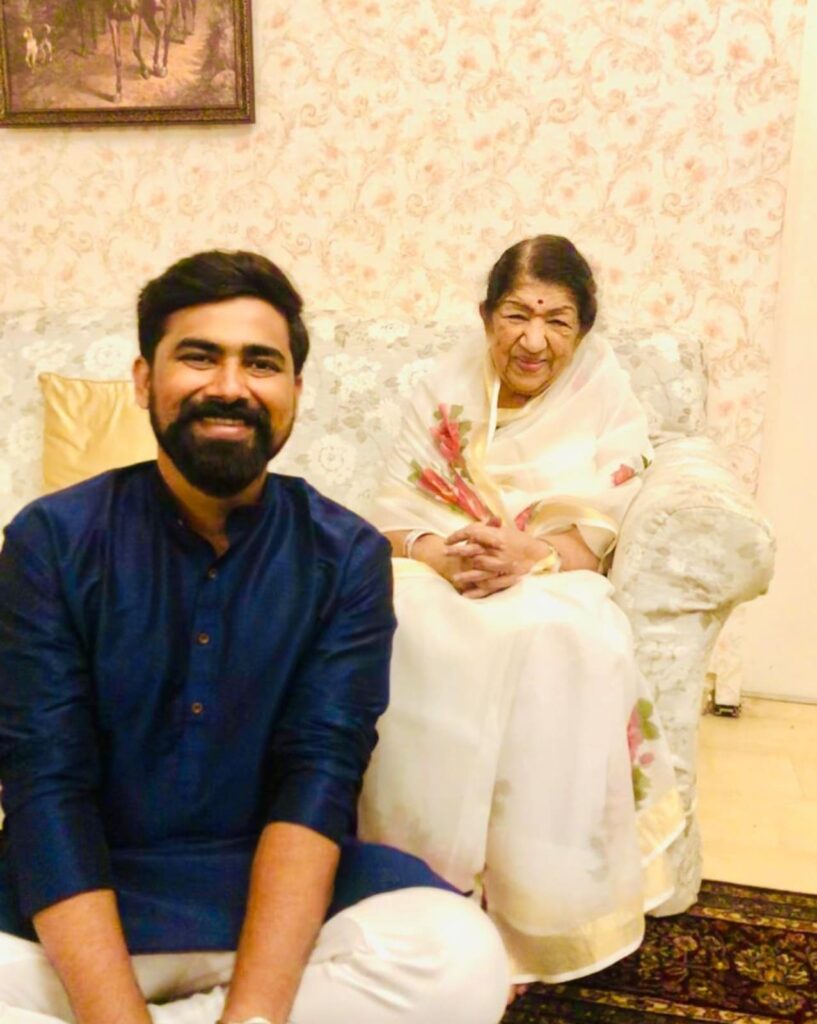 Vivek Surve with legendary Indian playback singer Lata Mangeshkar.